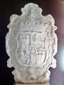 Escudo de la corona borbónica del antiguo ayuntamiento de Lucena (1771).